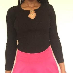 Black long sleeve shirt with a heart ring